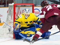 Team Latvia defenseman Krisjanis Sarts (2) takes a shot on Team Sweden goaltender Melker Thelin (35) during the first period of an IIHF World Junior Hockey Championship quarterfinal match in Ottawa, Ontario Thursday, Jan. 2, 2025. (Spencer Colby/The Canadian Press via AP)

- Ottawa;Ontario;Canada;Cppixottawa;Hockey;Tournaments;World Juniors;Ottawa25;Ottawa2025;athlete;athletes;athletic;athletics;Canadian;competative;compete;competing;competition;competitions;competitive;farm;game;games;Jr;junior;juniors;League;minor;minors;play;player;playing;pro;professional;sport;sporting;sports;team;tournament;World;TD Place