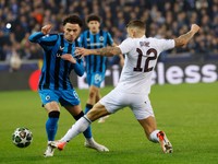 Brugge's Chemsdine Talbi, left, fights for the ball with Aston Villa's Lucas Digne during the Champions League round of 16 first leg soccer match between Club Brugge and Aston Villa at the Jan Breydel Stadium in Bruges, Belgium, Tuesday, March 4, 2025. (AP Photo/Geert Vanden Wijngaert)

- XCHAMPIONSLEAGUEX