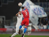 Lazio's Taty Castellanos goes for the header with Plzen's Svetozar Markovic during the Europa League round of 16 first leg soccer match between Lazio and Viktoria Plzen, at Rome's Olympic Stadium, Thursday, March 13, 2025. (AP Photo/Andrew Medichini)

- XEUROPALEAGUEX