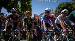 Belgium's Tim Wellens, Belgium's Victor Campenaerts, Canada's Michel Woods and France's Lenny Martinez, wearing the best climber's dotted jersey,, from left, ride during the twelfth stage of the Tour de France cycling race over 180.6 kilometers (112.2 miles) with start in Auch and finish in Hautacam, France, Thursday, July 17, 2025. (AP Photo/Thibault Camus)