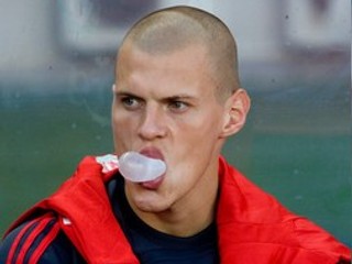 Martin Škrtel (vzadu) počas priateľského zápasu medzi FC Liverpool a Rapid Wien.
