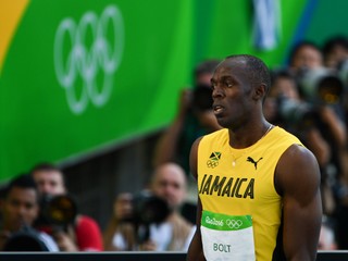 Usain Bolt zvládol svoj rozbeh a postúpil do semifinále behu na sto metrov.