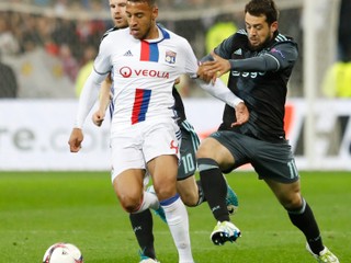 Corentin Tolisso (v strede).