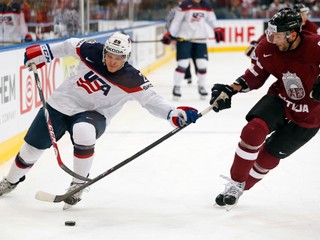 Maris Jass (vpravo) si za Lotyšsko zahral si na piatich majstrovstvách sveta.