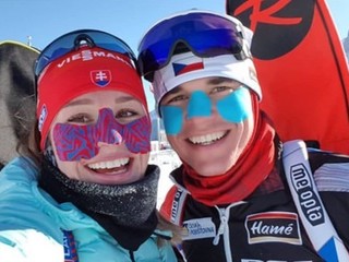 Paulína Fialková s českým biatlonistom Michalom Krčmářom pri tréningu v Canmore. 