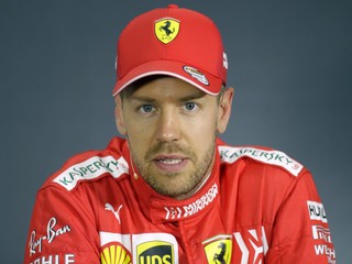 Jazdec Ferrari Sebastian Vettel.