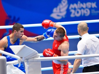 Slovenský boxer Andrej Csemez (vľavo) prehral na II. európskych hrách v Minsku v semifinále hmotnostnej kategórie do 75 kg. V súboji ho zdolal Ukrajinec Oleksandr Chyžňak (vpravo) v druhom kole RSC.