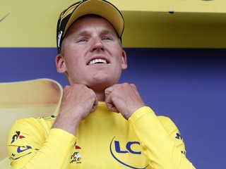 Holandský cyklista Mike Teunissen v žltom drese lídra priebežného poradia sa teší na pódiu po víťazstve v 1. etape 106. ročníka Tour de France z Bruselu do Bruselu 6. júla 2019. 