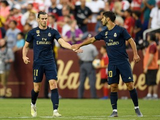 Na snímke hráči Realu Madrid zľava Gareth Bale a Marco Asensio v zápase Champions Cupu Arsenal Londýn - Real Madrid v americkom Landoveri 23. júla 2019.