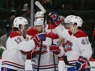 Tomáš Tatar (uprostred) oslavuje gól v zápase základnej časti NHL 2019/2020 Minnesota Wild - Montreal Canadiens.