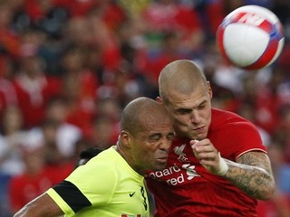 Škrtel (vpravo) odviedol pre Liverpool už množstvo poctivej defenzívnej roboty.