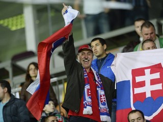 Futbaloví fanúšikovia.