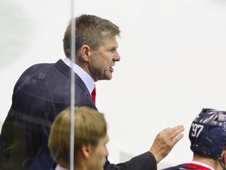 Tréner Slovana Čada.