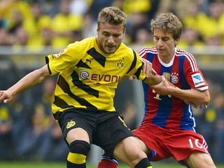 Gaudino (vpravo) v zápase proti Borussii Dortmund.