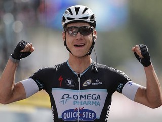 Nemecký cyklista Tony Martin z tímu Omega Pharma-Quick Step sa raduje z víťazstva v 9. etape.