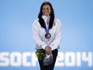 Justina Kowalczyková so zlatou medailou v Soči 2014.