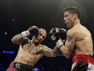 Miguel Cotto udiera Sergia Martineza.