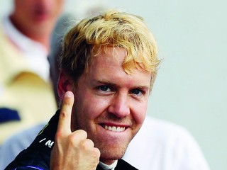 Vettel získal titul, za oslavu dostal jeho tím pokutu 25-tisíc eur
