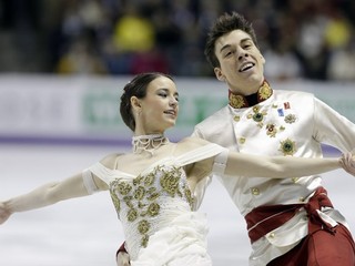 Slovenský tanečný pár Federica Testová a Lukáš Csölley počas krátkeho tanca na krasokorčuliarskych MS v kanadskom Londone v marci 2013.