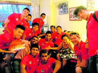 Futbalisti na jednej z návštev.