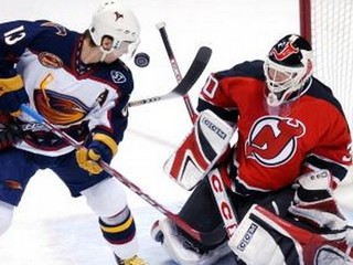 Kozlov v drese Atlanty na snímke z roku 2004.