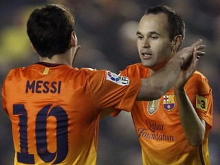 Lionel Messi a Andrés Iniesta.