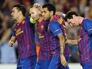 Xavi Hernandéz, Andrés Iniesta, Daniel Alvés a Lionel Messi (zľava) z FC Barcelona.