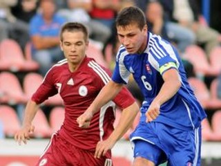Filip Kiss (vpravo) v zápase s Lotyšskom.