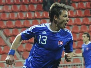 Filip Hološko.