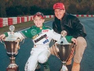 Trinásťročný Sebastian Vettel so svojím idolom Michaelom Schumacherom.