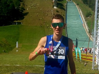 Marek Smetana s medailou. 