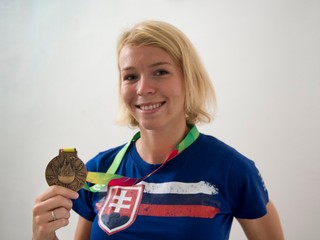 Ingrida Suchánková a bronzová medaila, archívna fotografia.