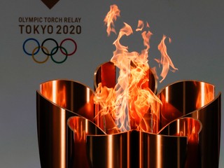 Pochodeň s olympijským ohňom.