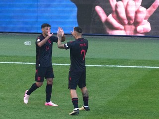 Albania's Qazim Laci, left, celebrates with Albania's Rey Manaj after scoring his side's opening goal during a Group B match between Croatia and Albania at the Euro 2024 soccer tournament in Hamburg, Germany, Wednesday, June 19, 2024. (AP Photo/Sunday Alamba)

- XEURO2024X