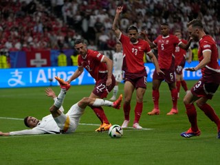 Switzerland's Fabian Schar, 2nd left, challenges Germany's Kai Havertz, left, during a Group A match between Switzerland and Germany at the Euro 2024 soccer tournament in Frankfurt, Germany, Sunday, June 23, 2024. (AP Photo/Darko Vojinovic)

- XEURO2024X