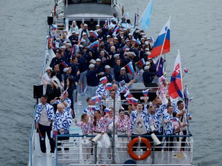 Paris 2024 Olympics - Opening Ceremony - Paris, France - July 26, 2024.
Athletes of Slovakia aboard a boat in the floating parade on the river Seine during the opening ceremony. REUTERS/Albert Gea

- CER-OPENING-----------------------