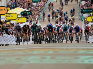 Eritrea's Biniam Girmay, wearing the best sprinter's green jersey, third from left, sprints to the finish line to win ahead of second place Belgium's Jasper Philipsen, far left, and third place Belgium's Arnaud de Lie, second left, during the eighth stage of the Tour de France cycling race over 183.4 kilometers (114 miles) with start in Semur-en-Auxois and finish in Colombey-les-Deux-Eglises, France, Saturday, July 6, 2024. (AP Photo/Jerome Delay)