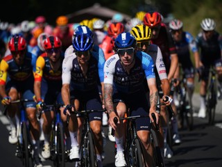 Britain's Jake Stewart sets the pace for the pack during the eighteenth stage of the Tour de France cycling race over 179.5 kilometers (111.5 miles) with start in Gap and finish in Barcelonette, France, Thursday, July 18, 2024. (AP Photo/Daniel Cole)