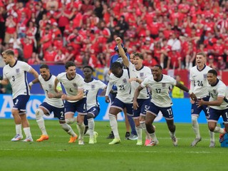 England players celebrate after Trent Alexander-Arnold scored the winning goal during the penalty shootout of a quarterfinal match between England and Switzerland at the Euro 2024 soccer tournament in Duesseldorf, Germany, Saturday, July 6, 2024. (AP Photo/Martin Meissner)

- XEURO2024X