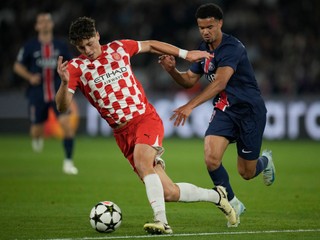 Girona's Ladislav Krejci, left, and PSG's Warren Zaire-Emeryduring the Champions League opening phase soccer match between Paris Saint-Germain and Girona at the Parc des Princes stadium in Paris, France, Wednesday, Sept. 18, 2024. (AP Photo/Christophe Ena)

- XCHAMPIONSLEAGUEX