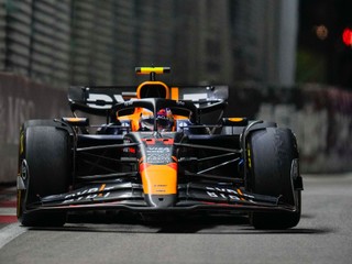 Red Bull driver Sergio Perez of Mexico steers his car during the Singapore Formula One Grand Prix at the Marina Bay Street Circuit, in Singapore, Sunday, Sept. 22, 2024. (AP Photo/Vincent Thian)

- f1autoz24