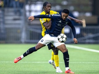 Young Boy's Joel Monteiro, left, and Aston Villa's Jacob Ramsey, right, challenge for the ball during the Champions League opening phase soccer match between Young Boys Bern and Aston Villa in Bern, Switzerland, Tuesday, Sept. 17, 2024. (Peter Schneider/Keystone via AP)

- XCHAMPIONSLEAGUEX