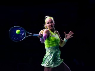 Slovakia's Rebecca Sramkova returns the ball against Danielle Collins, of the United States, during a tennis match at the Billie Jean King Cup Finals at the Martin Carpena Sports Hall, Thursday, Nov. 14, 2024, in Malaga, southern Spain. (AP Photo/Manu Fernandez)