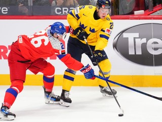 Sweden forward Otto Stenberg (25) looks to pass the puck as Czechia's Matteo Koci (26) defends during second-period IIHF World Junior Hockey Championship bronze medal game action in Ottawa, Ontario, Sunday, Jan. 5, 2025. (Sean Kilpatrick/The Canadian Press via AP)

- Ottawa;Canada;Canadian;cppixott;cppixottawa;Hockey;Tournaments;World Juniors;World Jrs 2025 competition;jrs;juniors;team;tournament;World Jrs 2025 competition