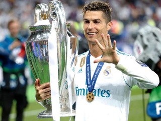 FILE - Real Madrid's Cristiano Ronaldo celebrates with the trophy after winning the Champions League Final soccer match between Real Madrid and Liverpool at the Olimpiyskiy Stadium in Kiev, Ukraine, Saturday, May 26, 2018. (AP Photo/Pavel Golovkin, File)