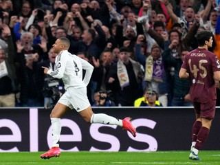 Real Madrid's Kylian Mbappe runs to celebrate after scoring his sides first goal during the Champions League playoff second leg soccer match between Real Madrid and Manchester City at the Santiago Bernabeu Stadium in Madrid, Spain, Wednesday, Feb. 19, 2025. (AP Photo/Manu Fernandez)

- XCHAMPIONSLEAGUEX