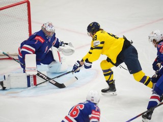 Sweden's William Nylander misses in front of United States' goalkeeper Jeremy Swayman during the semifinal match between Sweden and the United States at the ice hockey world championships in Stockholm,Sweden, Saturday, May 24, 2025. (AP Photo/Petr David Josek)