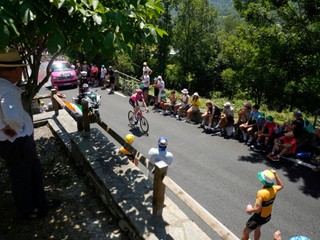 Denmark's Kasper Asgreen climbs during the thirteenth stage of the Tour de France cycling race, an individual time-trial over 10.5 kilometers (6.5 miles) in the Pyrenees mountains with start in Loudenvielle and finish in Peyragudes, France, Friday, July 18, 2025. (AP Photo/Mosa'ab Elshamy)