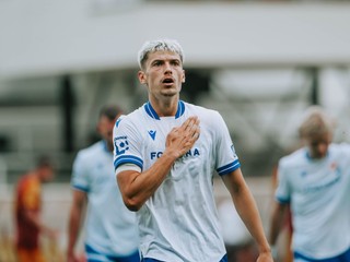Slovenský futbalista Tomáš Rigo sa teší z gólu v drese Baníka Ostrava.