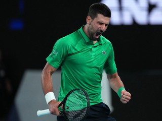 Novak Djokovic of Serbia reacts during his semifinal match against Jannik Sinner of Italy at the Australian Open tennis championship in Melbourne, Australia, early Saturday, Jan. 31, 2026. (AP Photo/Asanka Brendon Ratnayake)